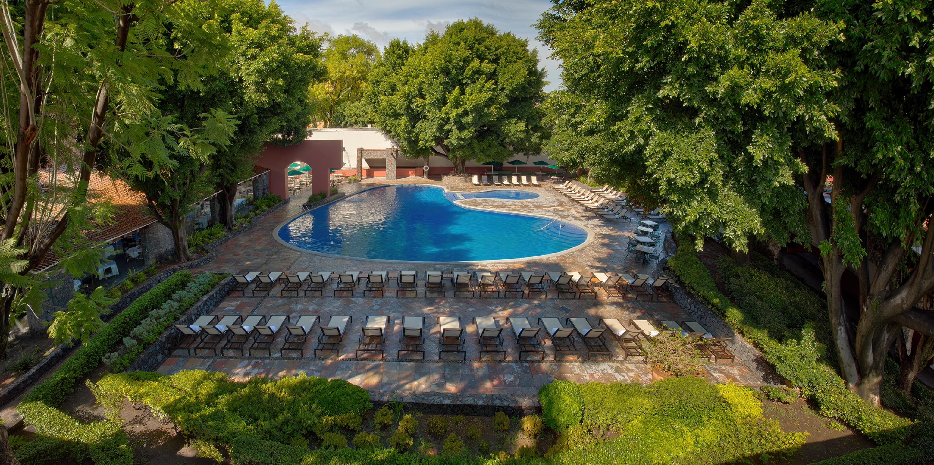 Отель Hacienda Jurica By Brisas Керетаро Экстерьер фото The pool at the hotel